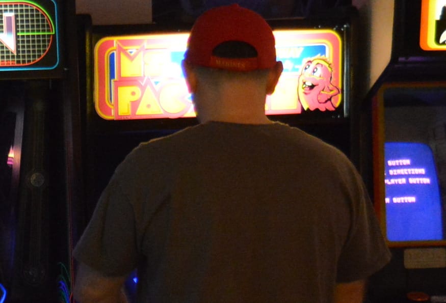 David Race playing Ms Pac Man