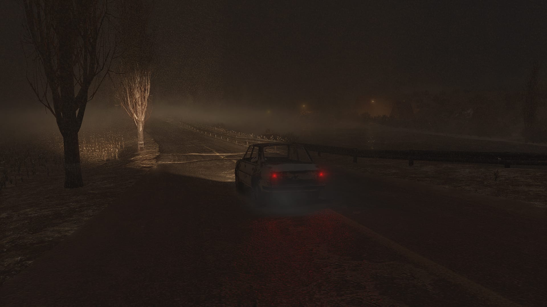 A cars headlights illuminate a foggy night in a still from this as of yet untitled game